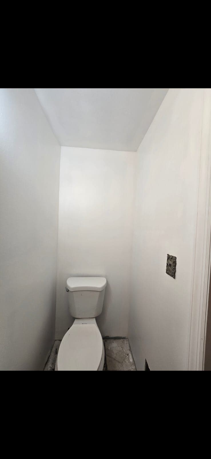 Toilet alcove rebuilt and repainted after mold remediation