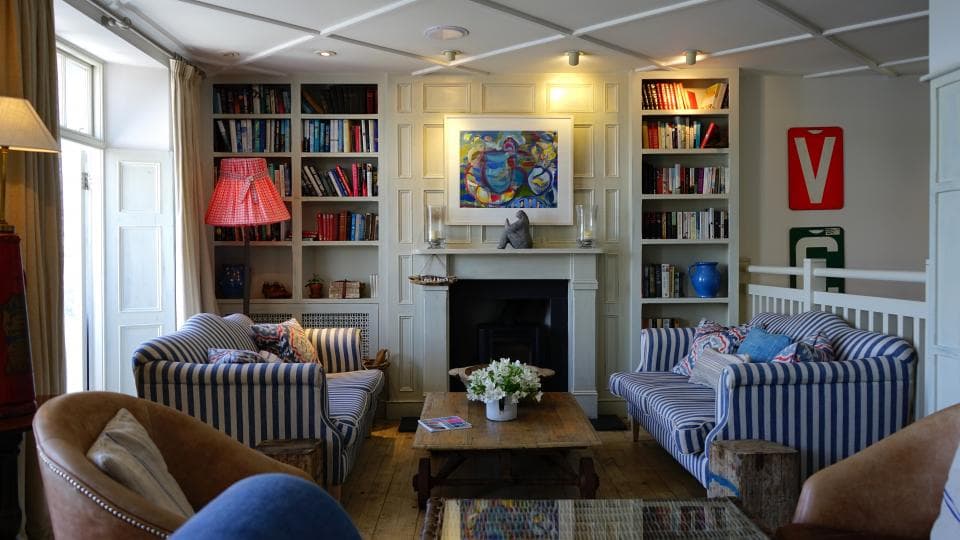 Living room with a brick fireplace